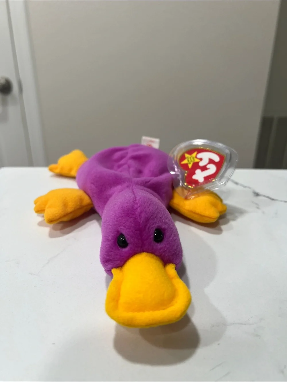 Ty Mint condition  “Patti “Purple Platypus Plush with Yellow Feet and Bill